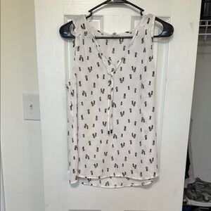 White Sleeveless Top with Black Pattern